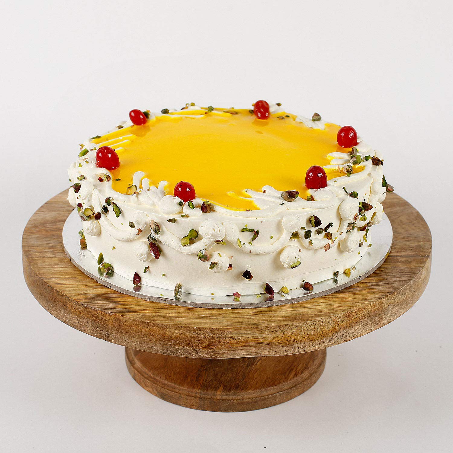 Ferns N Petals Cream Pista Pineapple Cake Image Ferns N Petals Cream Pista Pineapple Cake Image